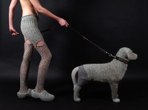 Photographic artwork by Nanon Morsink in co-production with Jan Beerling, titled Hendrika with dog, part of the Longstocking Series