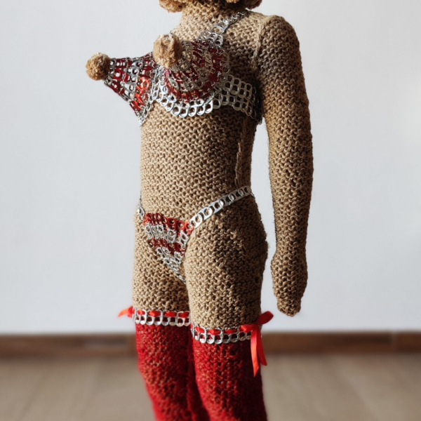 Sculptural work titled Hi, they call me Precious by contemporary artist Nanon Morsink, made from rope, can tabs, doll, and paint.