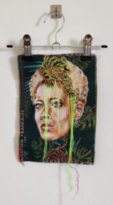 Artwork by Nanon Morsink titled Wallflower, made with acrylic on pre-printed fabric and embroidery
