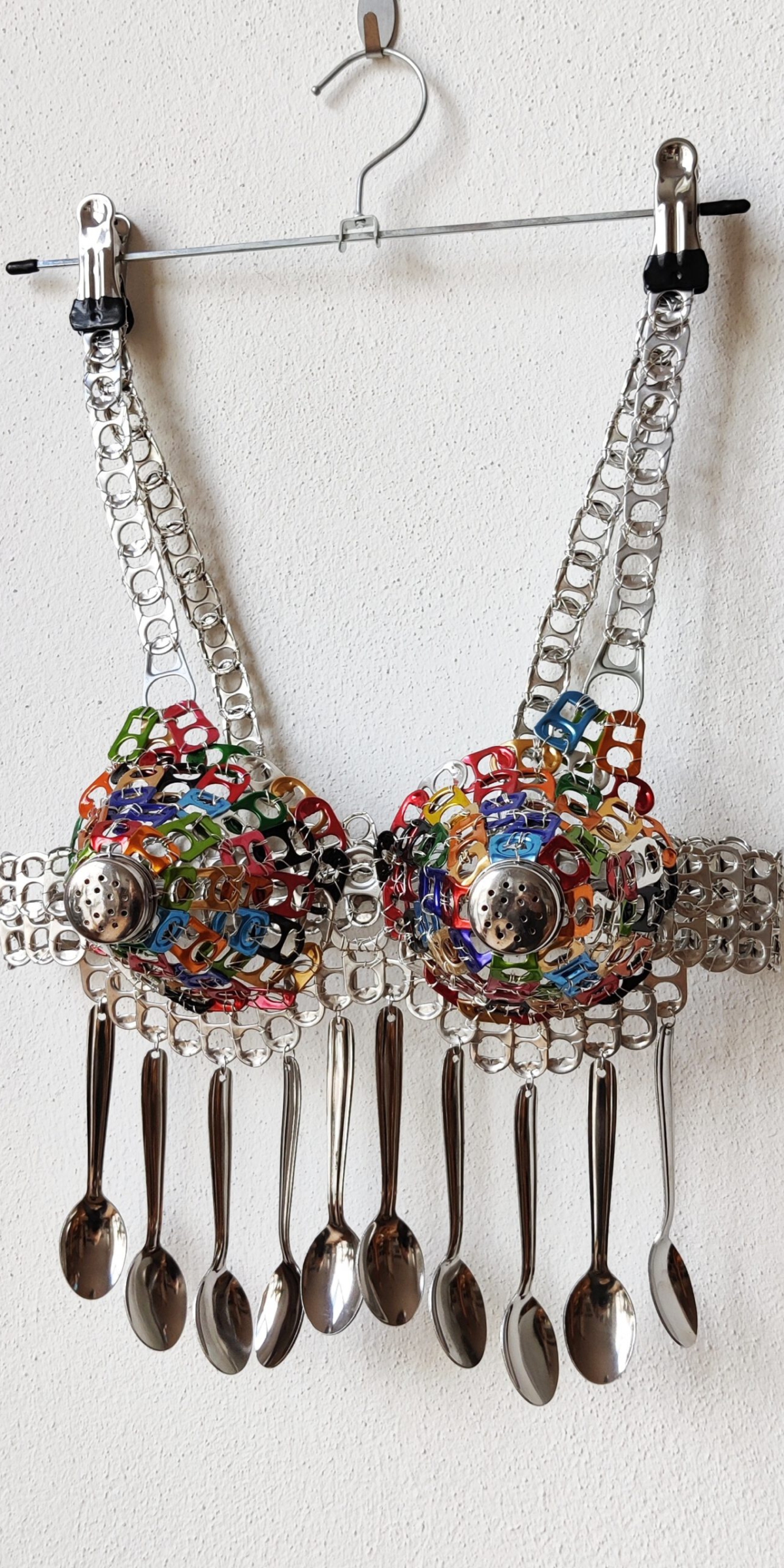 The Girl Can’t Cook I, Safety Lingerie Series, can tabs, silver thread, spoons, salt shaker caps by contemporary artist Nanon Morsink