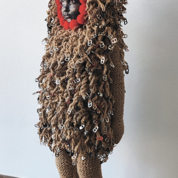 Sculptural work titled La Resistencia (de las tres virtudes de un artista) by contemporary artist Nanon Morsink, made from rope, wool, horns, can tab, nails, bird, and a doll.