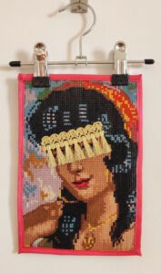 Artwork by Nanon Morsink titled Wallflower, made with acrylic on pre-printed fabric and embroidery