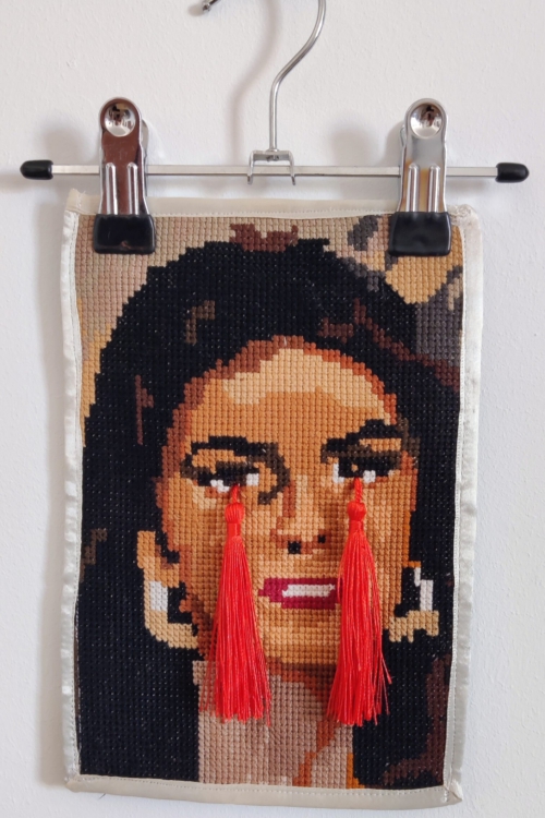 Artwork by Nanon Morsink titled Wallflower, ready-made embroidery with applicated tassels