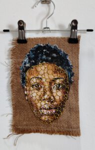 Artwork by Nanon Morsink titled Wallflower, made with acrylic on pre-printed fabric and embroidery