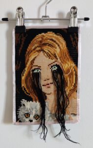 Artwork by Nanon Morsink titled Wallflower, made with acrylic on pre-printed fabric and embroidery