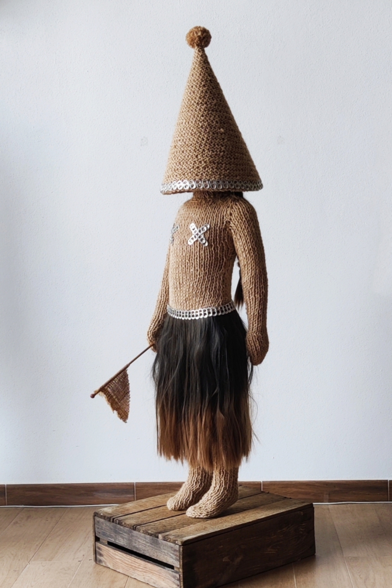 Sculptural work titled The party is over by contemporary artist Nanon Morsink, made from rope, can tabs, a doll, and hair.