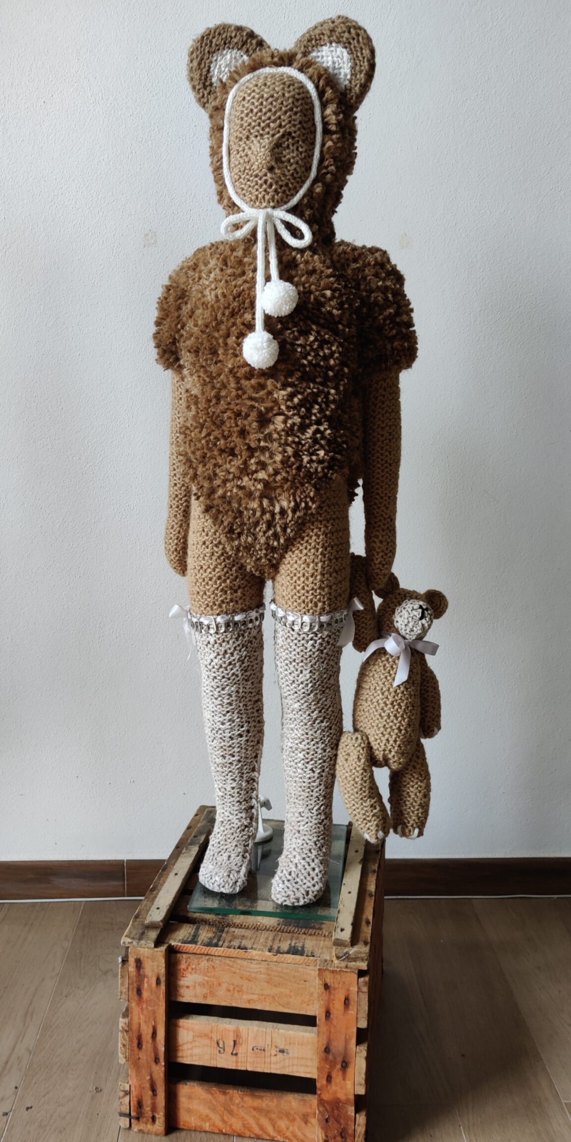El oso de peluche, by Nanon Morsink. Contemporary textile sculpture made with rope, can tabs, ribbon, fiberfill, paint, and a doll. Mixed media fiber art. 120 x 45 x 30 cm.