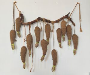 Large contemporary textile sculpture with branch, wool and rope – “Paradise Lost” by mixed media artist Nanon Morsink