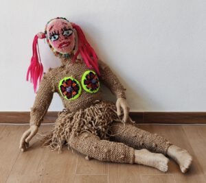 Sculptural work titled Ragdoll by contemporary artist Nanon Morsink, made from rope, wool, fiberfill, artificial hair, hands and feet.